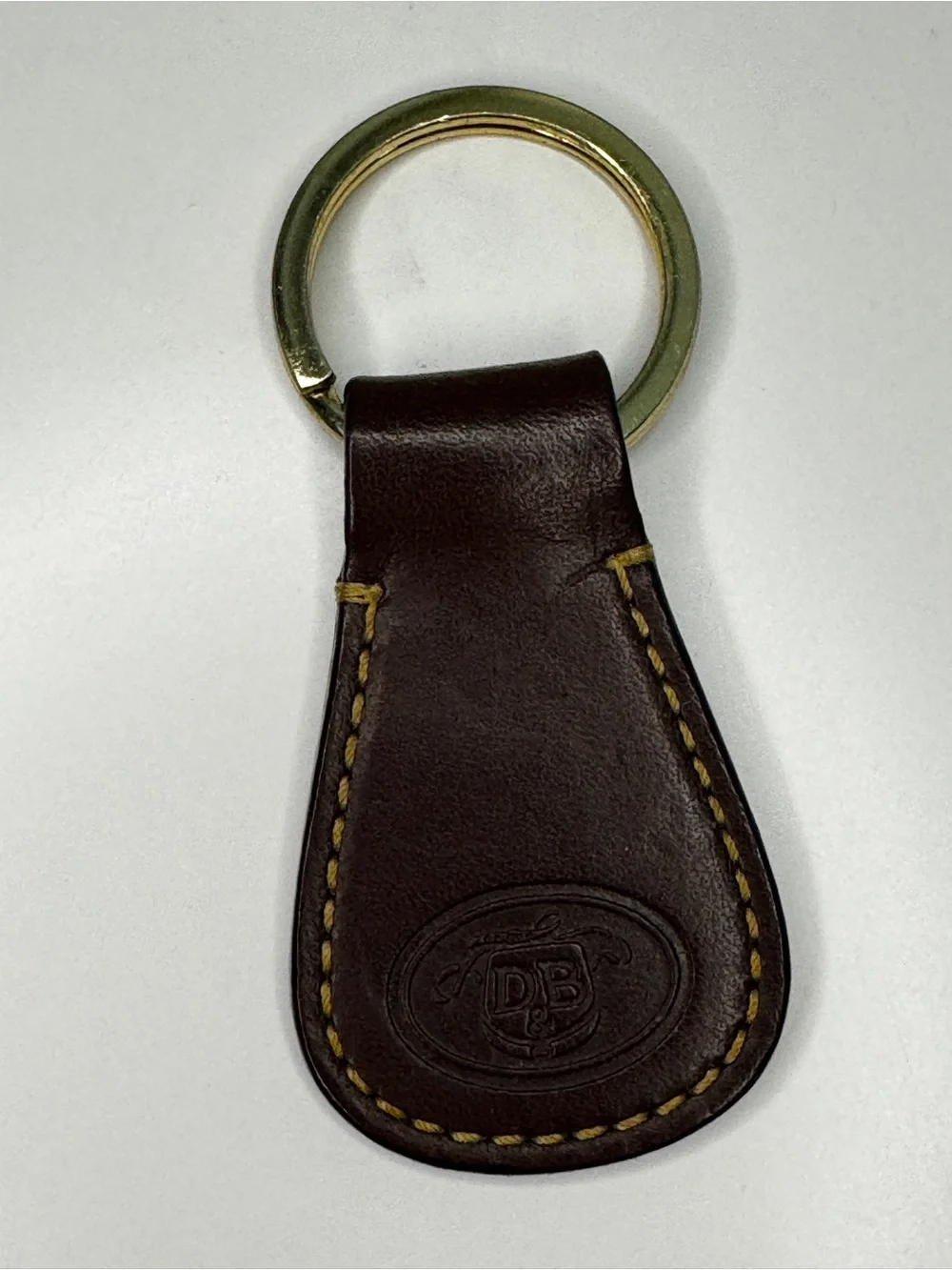 Dooney & Bourke Brown Leather Key Ring with Gold Hardware